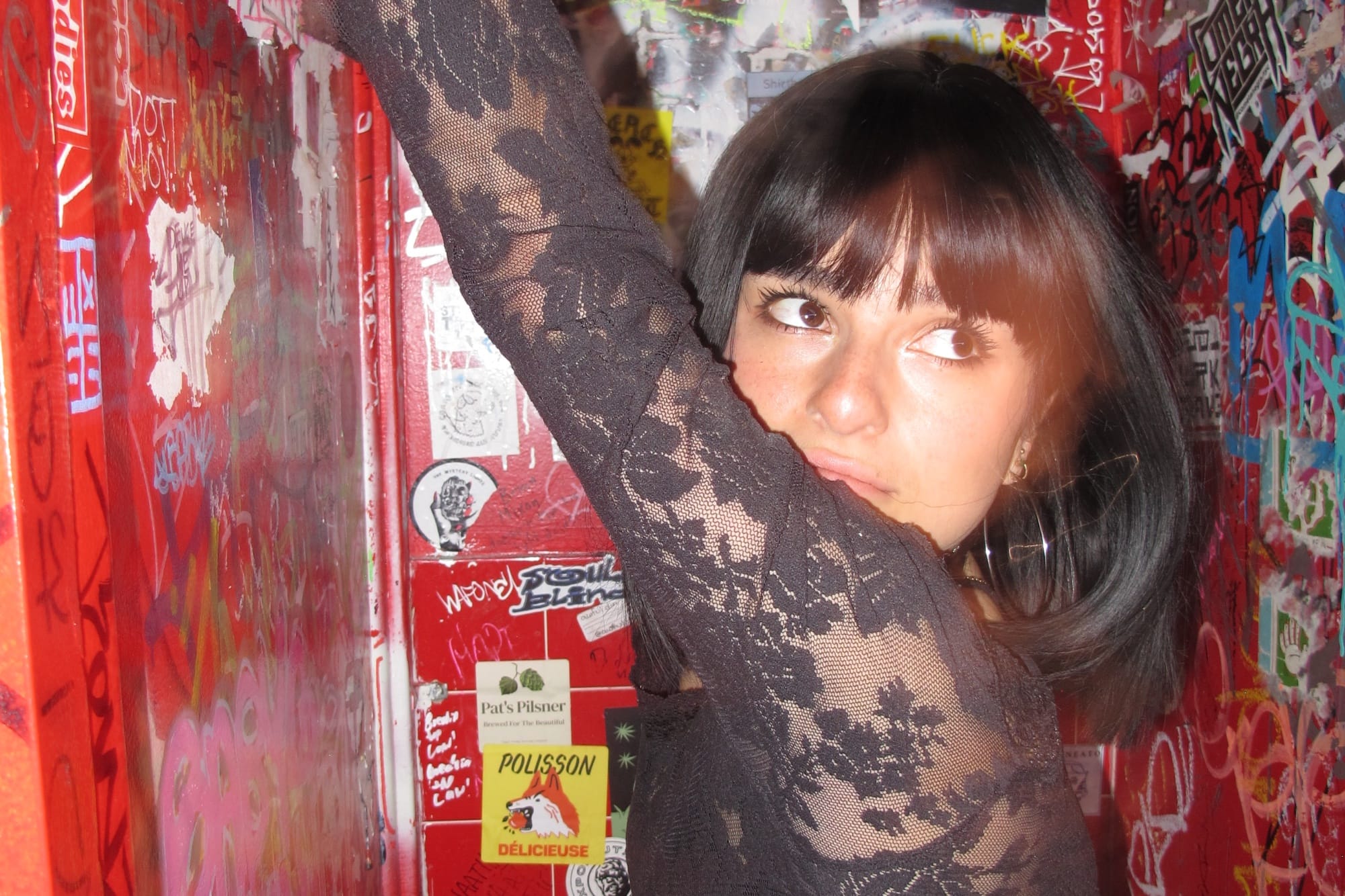 renforshort in a club bathroom