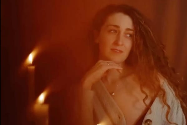 Hillary Reynolds in candle light